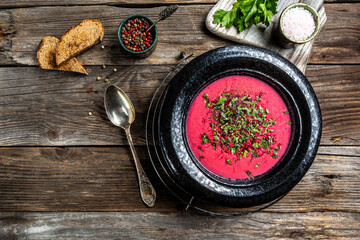 Ukrainian traditional borsch. Russian vegetarian red soup. Top view. Borscht, borshch with beet. Plate of red beet root soup borsch. Traditional Ukraine food cuisine