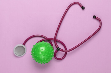 Diagnosis of coronavirus, pneumonia. Stethoscope with strain of virus on pink background