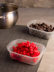 Frozen berries. Red berries. Kalina. Black currant. Cooking process. Home preparations for the winter.