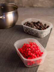 Frozen berries. Red berries. Kalina. Black currant. Cooking process. Home preparations for the winter.