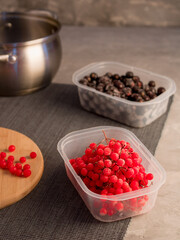 Frozen berries. Red berries. Kalina. Black currant. Cooking process. Home preparations for the winter.