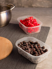 Frozen berries. Red berries. Kalina. Black currant. Cooking process. Home preparations for the winter.
