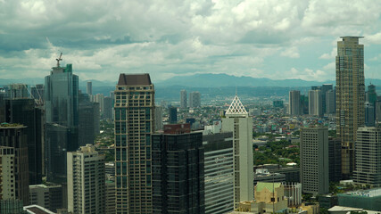 The city of Manila, the capital of the Philippines. Modern metropolis. Modern buildings in the city center.