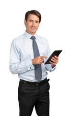 Businessman in blue shirt and tie standing with tablet in hands, isolated over white background. Caucasian manager smiling, looking at the camera