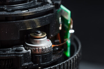 Fototapeta na wymiar Motor built into the lens barrel for close-up autofocus, macro shooting
