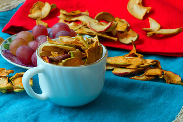 dry apples in a mug and rapes