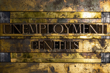 Unemployment Benefits on grunge textured copper and gold background