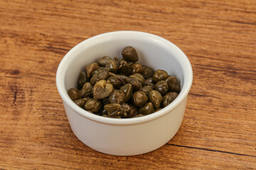 Tasty capers in the bowl