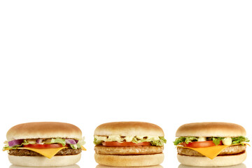 Three delicious burgers with different fillings horizontally.