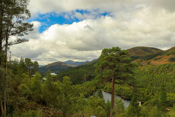 A view down from the hills of Scotland to the glens, rivers and lochs below