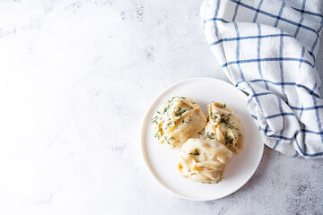 Steamed manta rays with meat sprinkled with dill in a plate