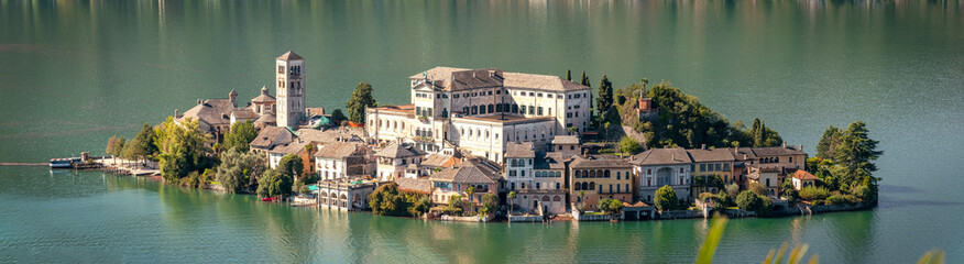 The world famous Orta San Giulio island, in the Orta Lake (piedmont, Northern Italy) seen from the...