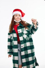 pretty woman in medical mask new year clothes holiday christmas