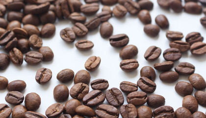 Coffee beans isolated on white background.A coffee bean is a seed of the Coffea plant and the source for coffee.