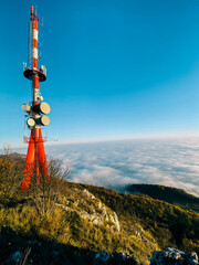 Obraz premium TV tower on Kalnik mountain in Prigorje, Croatia (near Križevci city). The view from the top of the mountain next to the powerful tower antenna.