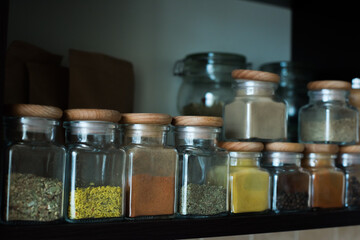 spices in jars on the shelf