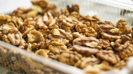 Background of walnuts close up from above healthy food concept