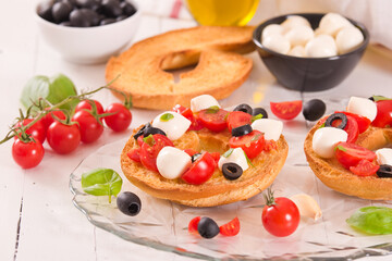 Friselle with tomatoes and mozzarella cheese.