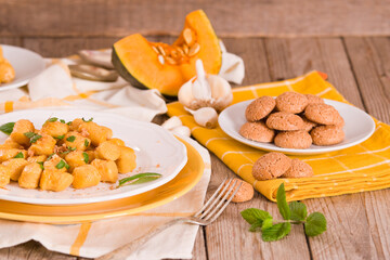 Pumpkin gnocchi with grated amaretti cookies. 