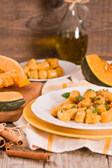 Pumpkin gnocchi with grated amaretti cookies. 
