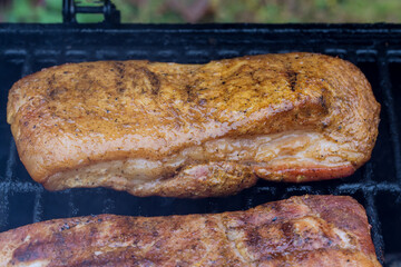 Preparing traditional juicy smoked pork lard