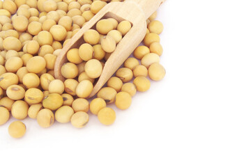  Soy beans and wooden scoop isolated on white with space for text