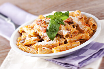 Macaroni Bolognese on a plate. Typical Italian dish.