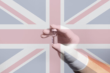 Flag of United Kingdom illustrating campaign for global vaccination against Covid-19. Epidemic Virus