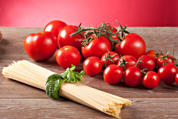 Ingredients for spaghetti with tomato sauce. Typical Italian dish.