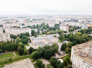Aerial view of town with socialist soviet panel building at cloudy day. Buildings were built in the...