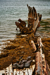 shipwreck with wooden frames and a rusted engine