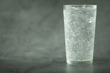 Soda water with ice cubes for refreshing.