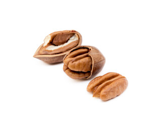 Fresh pecan nuts isolated on a white background