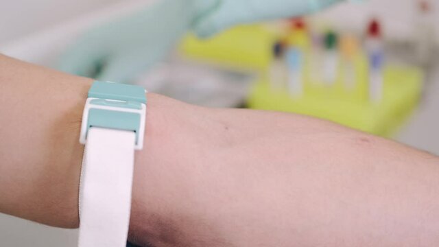 doing blood test sample  for safety doctor woman patient hand medical nurse medicine care health hospital people injection treatment massage bandage clinic body child pain therapy beautiful white heal