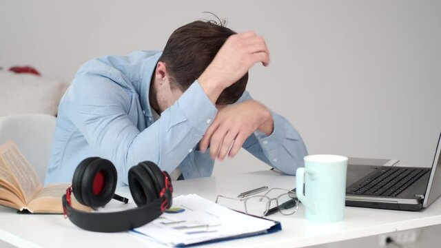 sitting infront of the laptop during meeting to reduce corona virus infection business computer headset businessman young call headphones office operator woman service person phone customer