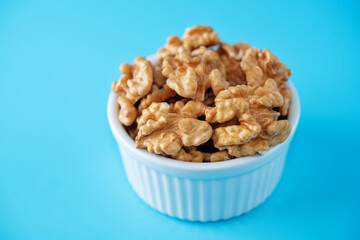 raw dried healthy walnuts nuts on a background