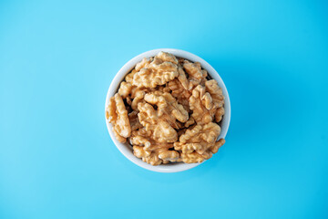 raw dried healthy walnuts nuts on a background