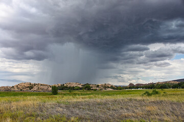 An incoming rainstorm at Willow Lake outside of Prescott, Arizona - 401804234