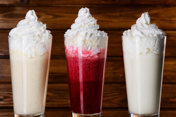 Christmas drinks on wood background