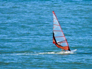 Windsurfing in the Pacific ocean on the waves