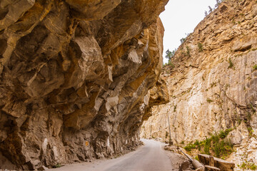 View from hilly mountain road Hindustan Tibet Road connecting Kaza city with Shimla state capital travelling through Himalayas mountains near Kalpa Kinnaur, Himachal Pradesh, India.