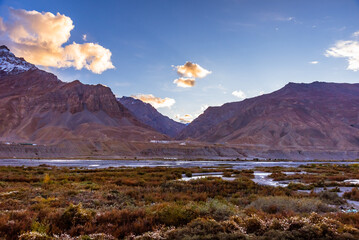 Panoramic landscape of Spiti river valley during sunset near Kaza town in Lahaul and Spiti district of Himachal Pradesh, India.