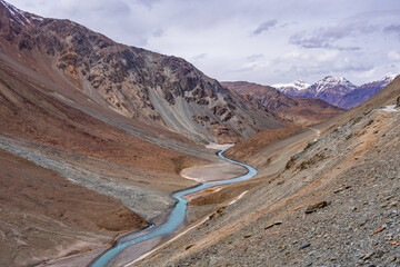 Meander is one of a series of regular sinuous curves in a river, produced by river as it erodes the...
