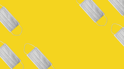 Shadow grey medical mask on yellow background. Pantone colors. Virus prevention. Digital collage. Pandemic concept. Safety matters. Copy space