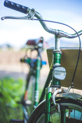 Fototapeta na wymiar Retro bike adventure: Front picture of vintage bike, blurred background