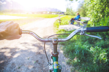 Obraz na płótnie Canvas Retro bicycle handlebar and breaks outdoors, blurred background