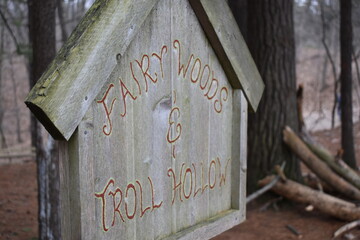 fairy woods and troll hollow garden sign in the arboretum