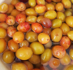 yellow and red plums