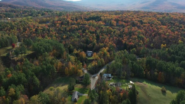 New England, Vermont, USA. Aerial View of Coloful Hillside and Houses on Autumn Day. Colorful Landscape, Drone Shot