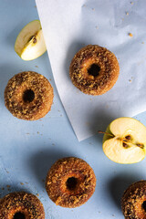 Close-up of sugared apple cider doughnuts on blue